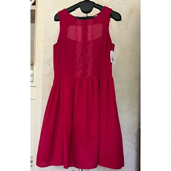 green emerald velvet dress JS Jessica Simpson Sosa Tiered Dress in Shell-Calia Paisley